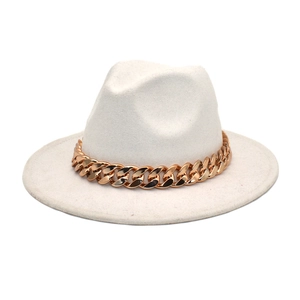Detail of white wool fedora hat featuring a chunky polished gold metal chain band decoration