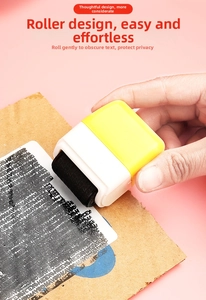 Detail showing the privacy roller stamp masking personal info on a shipping label