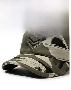 Detail of camouflage flat top military cap featuring canvas fabric and embroidered badge