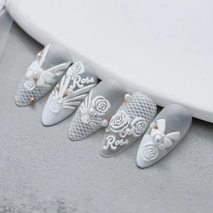 3D embossed 5D nail art stickers with white rose petals, pearls and mesh textures