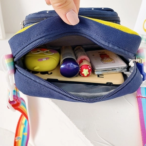 Navy blue unicorn crossbody bag for kids with rainbow strap and spacious interior