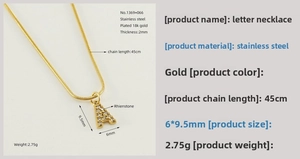 Detail of 18K gold plated stainless steel letter A pendant with sparkling rhinestones