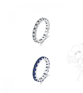 Detail showing S925 silver stamp on eternity rings with white and blue stones