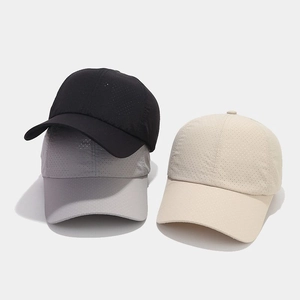 Breathable quick-dry baseball caps in black, grey, and beige with laser-cut vents