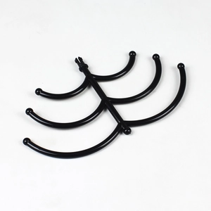 Detail of black plastic jewelry stand showing the six-claw branch for hanging necklaces