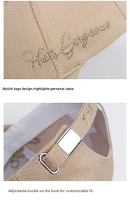 Dettaglio del ricamo dorato Hello Gorgeous su berretto di cotone beige con fibbia