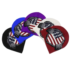 Five-piece set of knitted beanies featuring distressed USA flag design in various colors
