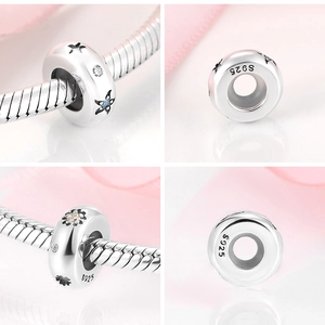 Detailed views of S925 sterling silver flower charm with zircon and star engravings