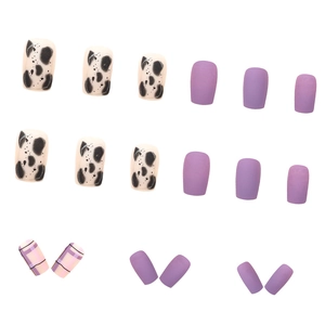 Matte leopard and plaid press-on nails set featuring purple and cow print patterns