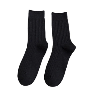 Classic black mid-calf cotton socks with vertical ribbed knit texture for women