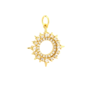 Detailed macro view of a gold-plated sun pendant with zircon accents and hollow center