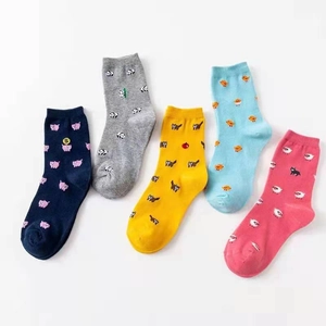 Detailed set of five colorful cotton socks with unique cartoon animal patterns