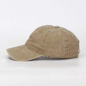 Side view of washed cotton baseball cap in khaki, showing six-panel texture and curved brim