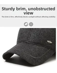 Close-up of dark grey winter baseball cap showing tweed texture and SPORT metal plate