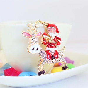 Portachiavi natalizio scintillante con Babbo Natale, renna e strass rossi e bianchi