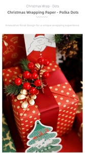 Close-up of red Christmas wrapping paper with gold polka dots and decorative gift tags