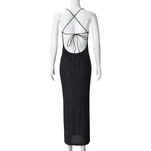 Detail of cross-tie backless design on black sequin maxi dress with silver glitter