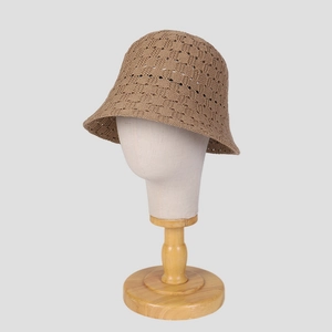 Breathable hollow-out knit bucket hat for women in caramel brown with foldable design
