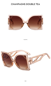 Champagne cat-eye sunglasses with unique geometric hollow temples and gradient tea lenses