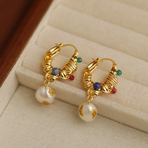Vintage French baroque pearl drop earrings with colorful gemstones in a beige jewelry box