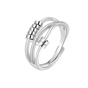 Rotating silver anxiety ring with movable beads and adjustable open band design