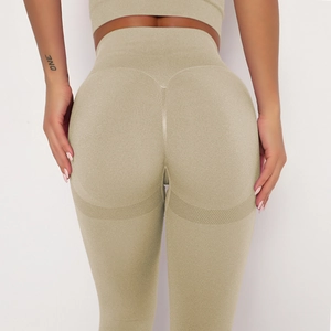 Detail of high waist seamless yoga leggings featuring peach lift and breathable mesh