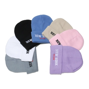 Various New York embroidered knit beanies in seven colors with turnover cuffs