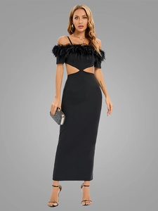Close-up of elegant feather trim neckline and waist cut-outs on a black evening gown
