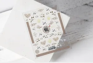 Detailed 5D nail art sticker featuring cranes and clouds with gold outlines