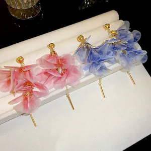 Elegant floral mesh earrings with long gold tassels in pink and blue for women