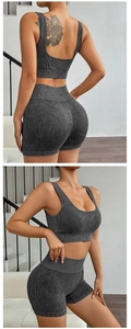 Detail of acid wash charcoal ribbed yoga set showing seamless high waist and scrunch butt