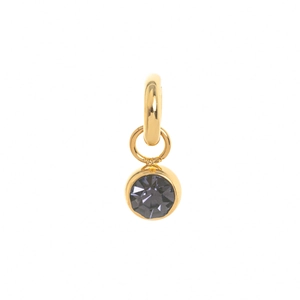 Minimalist gold-plated birthstone pendant featuring a faceted deep purple gem detail
