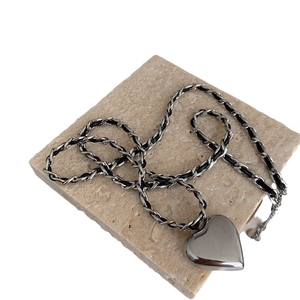Unisex silver titanium heart pendant necklace with braided black leather chain