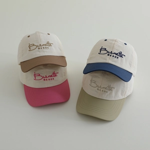 Kids quick-dry baseball caps in four colors featuring Burnette embroidery