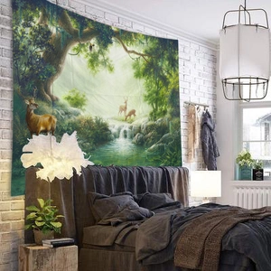 Close-up of a forest waterfall tapestry with deer used as a bedroom wall decoration