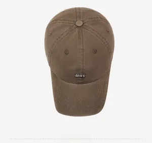 Overhead view of vintage brown baseball cap with detailed Fard Club embroidery