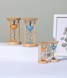 Bamboo hourglass timers in orange and blue sand colors, shown in large and small sizes