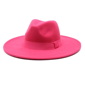 Detail of rose red wool fedora hat featuring 9.5cm wide brim and matching ribbon band