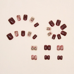 Deep cherry red press-on nails set with elegant tulip floral patterns and gold glitter accents