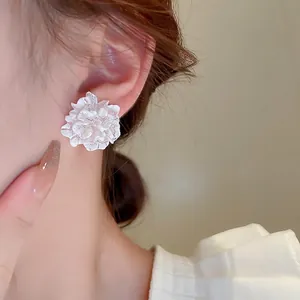 Elegant white layered petal flower stud earrings with a matte finish for women