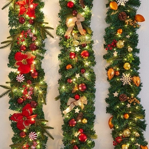 Three pre-lit Christmas wreaths with LED lights, poinsettias, pinecones and ornaments