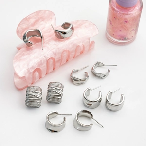 Chic silver irregular C-shape titanium steel earring set for women with diverse textures