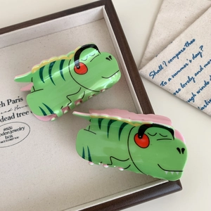 Lot de deux jolies pinces à cheveux dinosaures vertes en acrylique avec casque