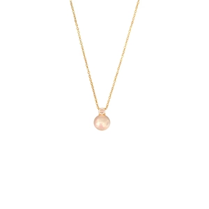 Elegant gold snake chain necklace featuring a polished pink round pearl and zirconia