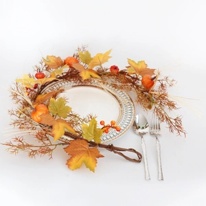 Detail of 100cm autumn maple leaf vine with mini pumpkins and berries on a white table