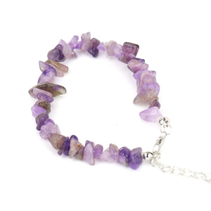 Close-up of natural amethyst chips bracelet with adjustable silver lobster clasp