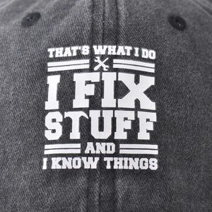 Washed cotton baseball cap in dark grey featuring funny printed text and wrench icon