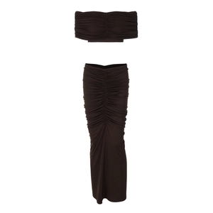 Detail view of dark brown two-piece set featuring tube crop top and ruched maxi skirt