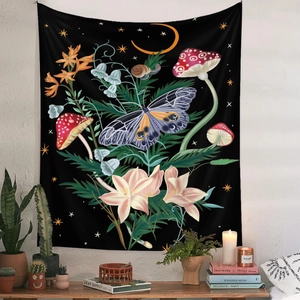Close-up of botanical tapestry featuring moth, mushrooms and celestial moon patterns