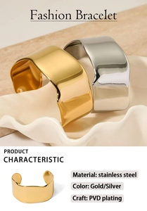 Detailed view of wide irregular stainless steel C-shaped bracelets in gold and silver
